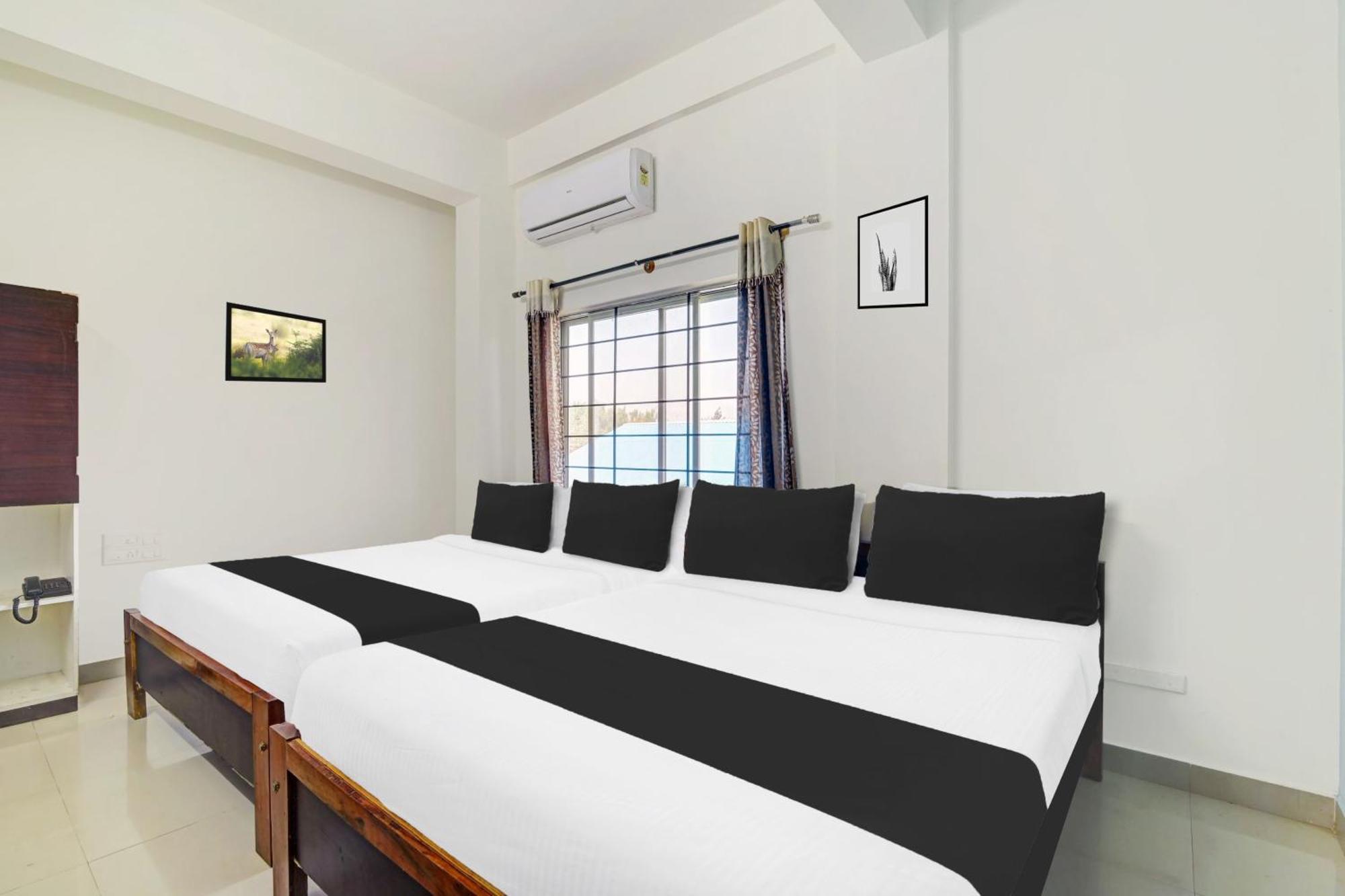 Hotel Super Collection O Chikmangaluru Near Railway Station Chikmagalūr Esterno foto